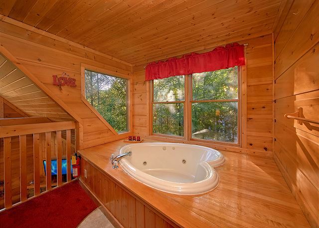 heart shaped tub in a cabin