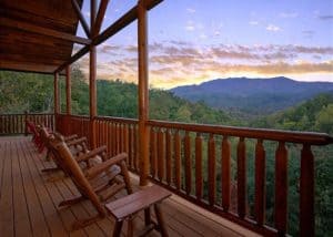 rocking chair cabin deck mountain view