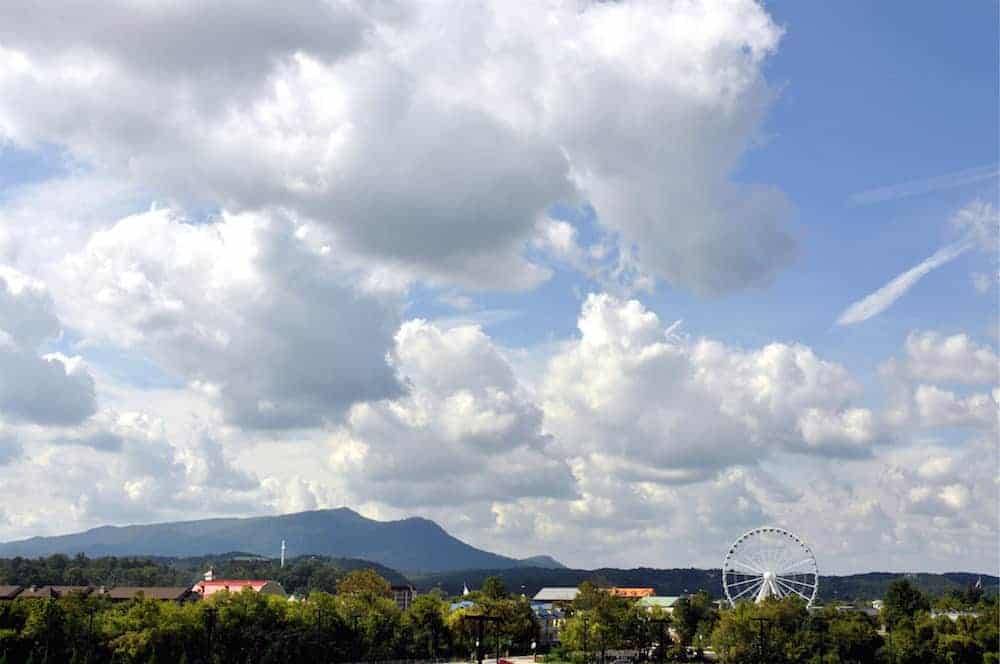A photo of Pigeon Forge that includes the Great Smoky Mountain Wheel at The Island.