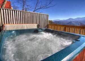 Bubbling hot tub on the deck of the Fox on the Run cabin in Gatlinburg.